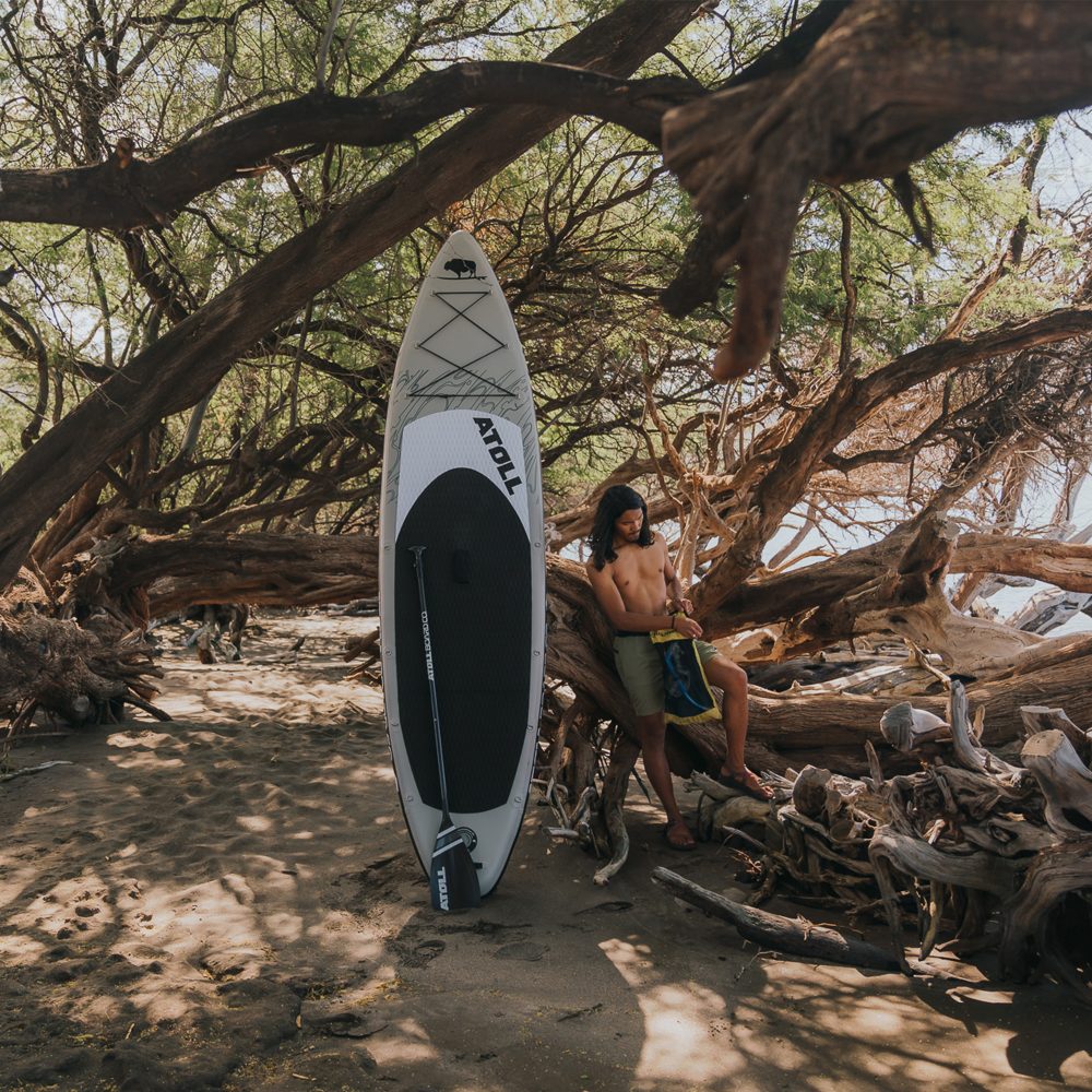 Grey paddle board beach